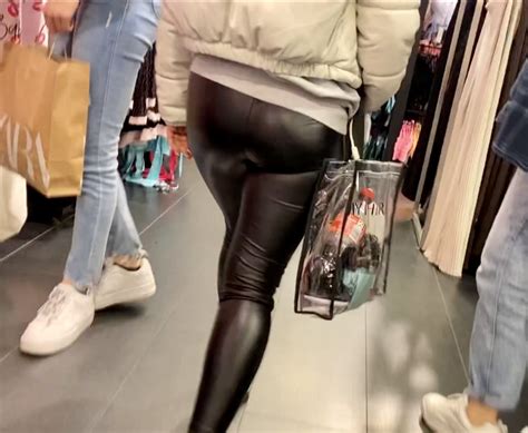 Tight Shiny Leather Leggings With Nice Round Ass In Front Of Me During Paying Spandex