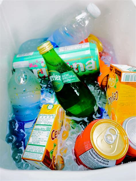 Sprite plastic bottle beside orange soda can photo – Free Montréal ...