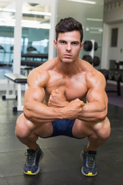 Shirtless Muscular Man Flexing Muscles In Gym Stock Image Everypixel