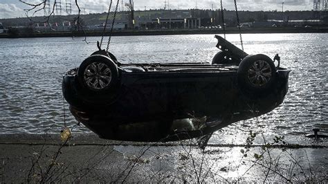 Cars Plunge Into River Pours Cold Water On Lovers Passions Photo