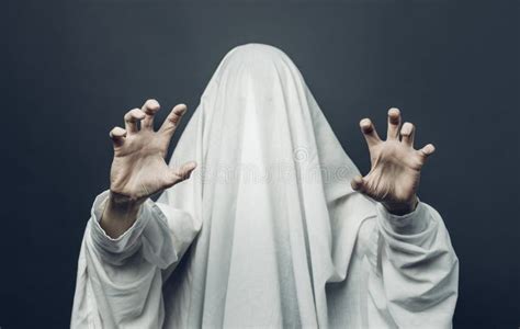 Spooky White Ghost Costume With Black Eyes On A Gray Background Halloween Horror Minimal