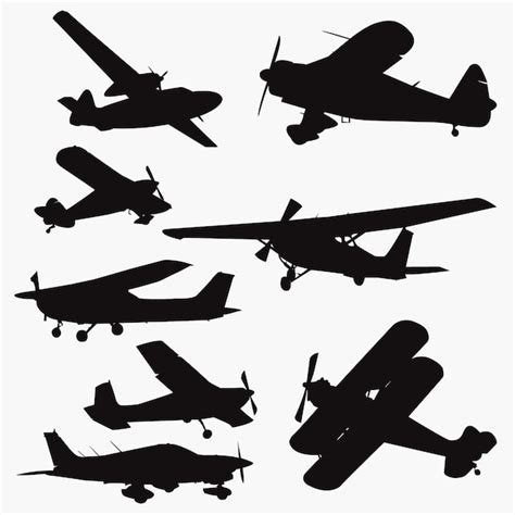 Small plane silhouettes | Premium Vector