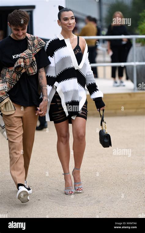 Dua Lipa and Anwar Hadid leaving the Burberry show Stock Photo - Alamy