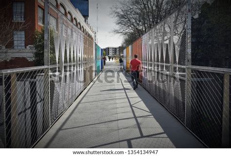 Man Walking Across Bridge Stock Photo 1354134947 Shutterstock