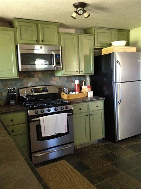 Pin By Llux Diesl On For The Home Green Kitchen Cabinets Dark Green Kitchen Kitchen Cabinet