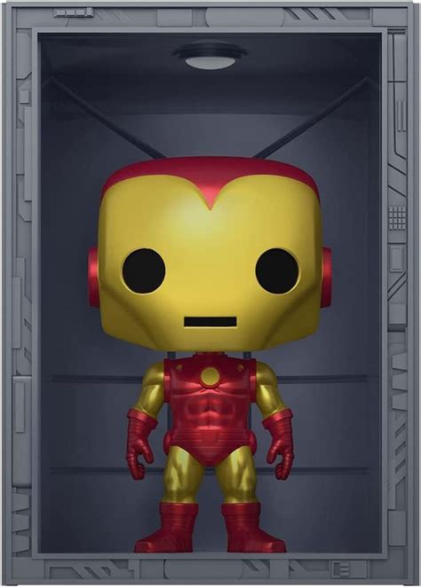 The Iron Man Pop Vinyl Figure Is Shown In An Open Metal Box With Its