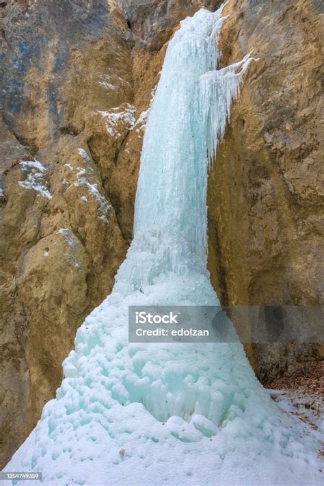 Ice Pillar On A Rock Wall Stock Photo - Download Image Now ...