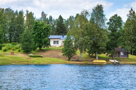 Cottage by the Lake in Rural Finland Stock Image - Image of green, pier ...