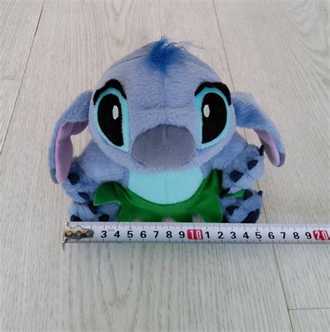 Walt Disney Blue Stitch 15cm Wearing Green Leaves Cartoon Character