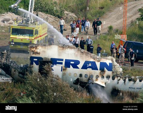 Officials View The Wreckage Of Air France Flight As It Lies In A