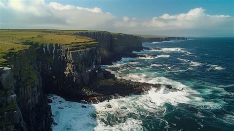 Premium Photo Breathtaking Coastal Cliffs And Crashing Waves Aerial View