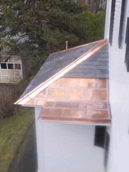 New Flat Seam Copper Roof With Hip And High Hat Triple M Contracting