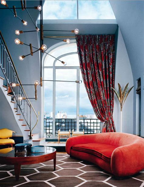 This Whimsical Room Combines A Bold Coral With Gold And Chocolate