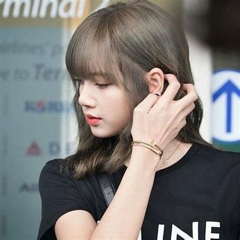 A Girl With Her Hand On Her Ear