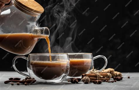 Premium Photo Indian Masala Chai Tea Hot Masala Chai Spiced Tea With Milk And Spices Is Poured