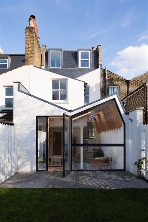 A Renovation Reviving London's 'Butterfly Roof' - IGNANT