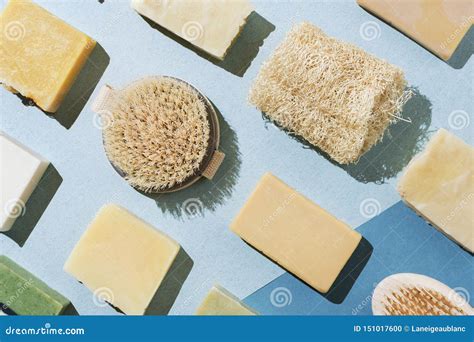 Flatlay Of Various Natural Handmade Soap Body Brushes And Loofah