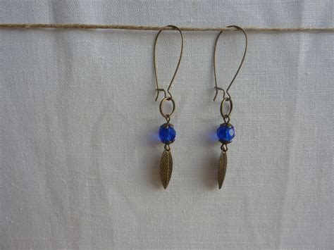 Boucles D Oreille Dormeuses Bronzes Avec Perle Bleue Boucles D