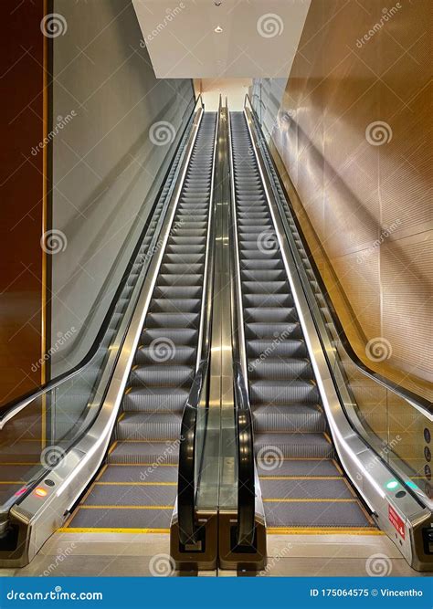 A Two Way Ascending And Descending Modern Escalators Stock Image