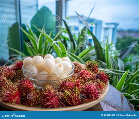 Rambutan Malaysian Sweet Delicious Fruits In Bowl And Bamboo Plate In