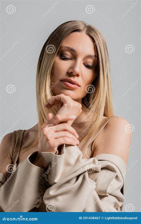 Portrait Of Blonde Woman In Beige Stock Image Image Of Fashionconscious Portrait