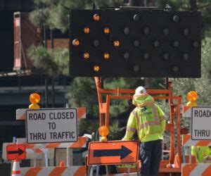 A Look at Traffic Control Flaggers - Roadway Construction Service