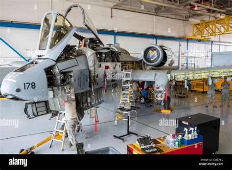 Airmen Perform Maintenance Work On An A 10 Thunderbolt From The 354th