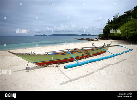 A Bangka Boat Pictured On Buktot Beach Near Mansalay Oriental Stock