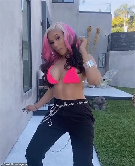 Cardi B Shows Off Her Ample Assets In A Pink Bikini Top After Making