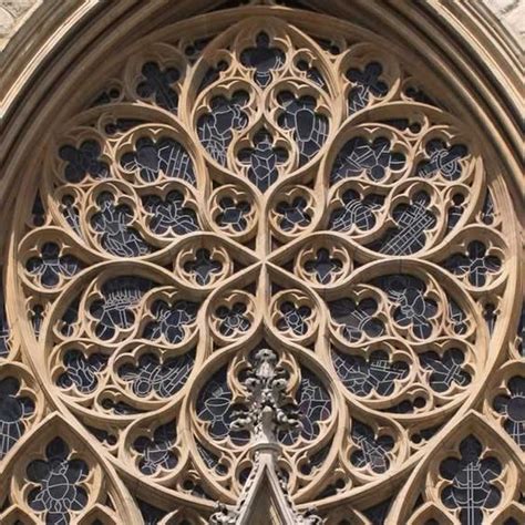 An Intricately Designed Window In The Side Of A Building