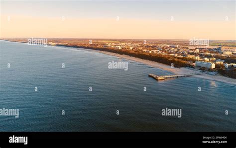 Port, lighthouse and pier in Kołobrzeg Stock Photo - Alamy