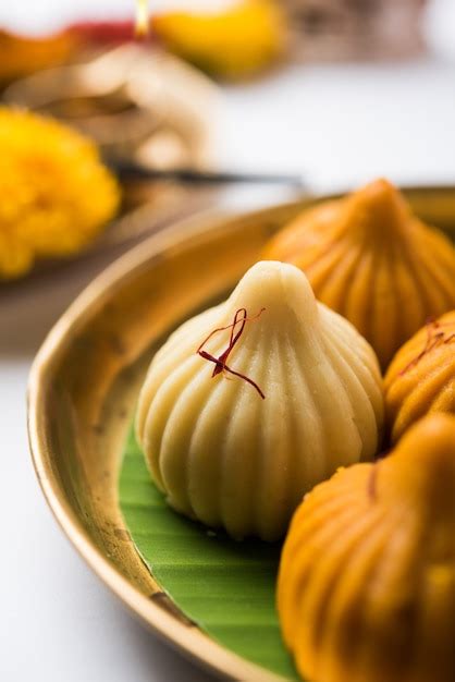 Premium Photo Sweet Modak Food Offered While Ganapati Pooja Or Ganesh