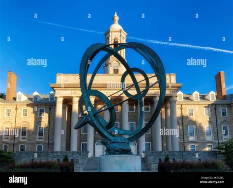 The Old Main building at sunrise on the campus of Penn State University ...