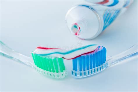 Toothbrush Of Clear Plastic With Blue Bristles White Blue Red