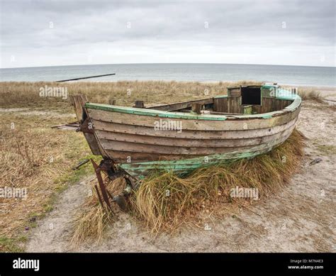 Abandoned Wrecked Boat Stuck In Sand Old Wooden Boat On The Sandy