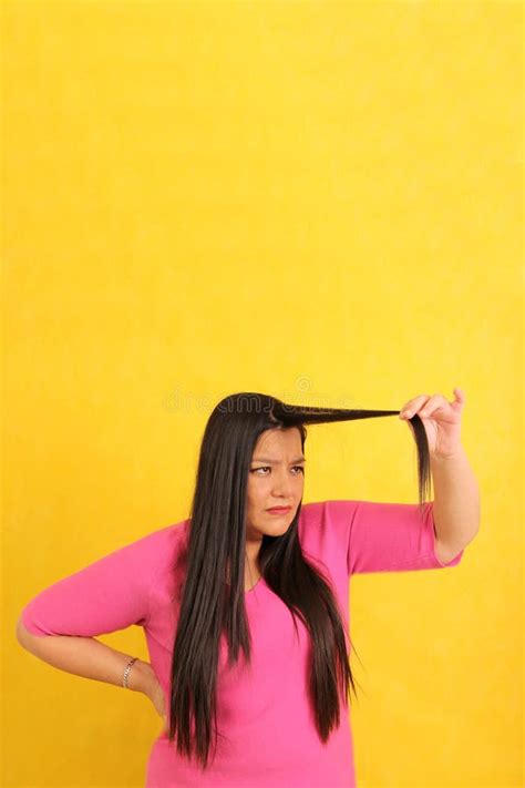 Year Old Latina Woman Suffers When She Sees The Ends Of Her Hair Split And Damaged By Lack Of