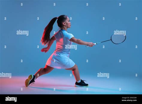 Winner Beautiful Dwarf Woman Practicing In Badminton Isolated On Blue