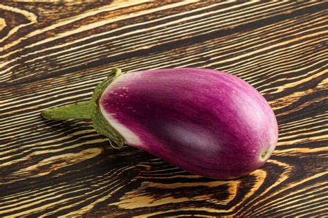 Premium Photo Raw Purple Ripe Eggplant For Cooking Over Background