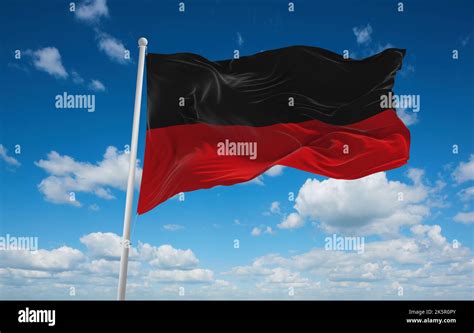 flag of Konigreich Wurttemberg, Europe at cloudy sky background,. flag ...