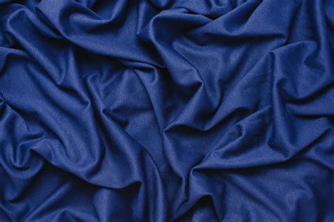 Premium Photo | Blue fabric background.