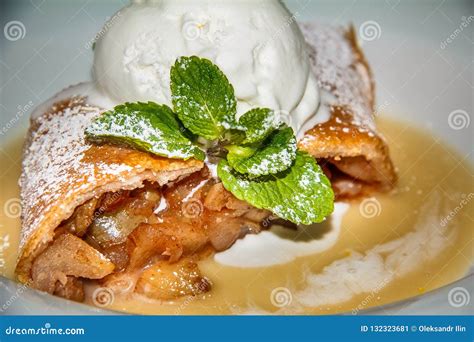 Apple Strudel with Ice Cream and Mint Stock Image - Image of cream ...