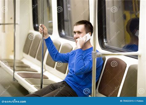 Young Man On Mobile Phone In Subway Train Stock Image Image Of Life