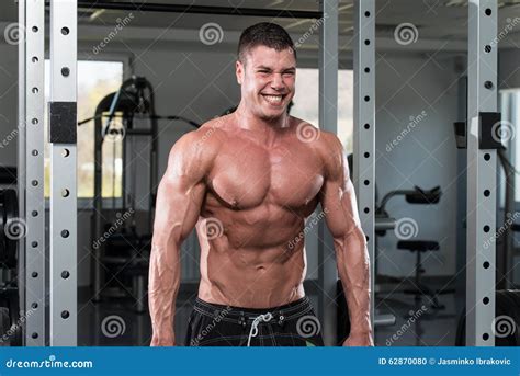 Exercise for Trapezius with Barbell Stock Photo - Image of people ...