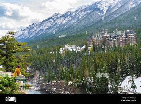 Fairmont Banff Springs And Bow River Falls In Snowy Autumn Sunny Day