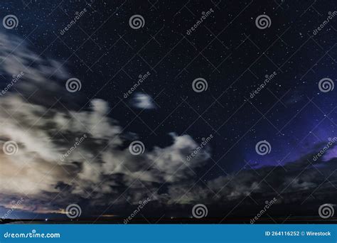 Starry Glowing in the Night Sky, Clouds Around Stock Photo - Image of night, nature: 264116252