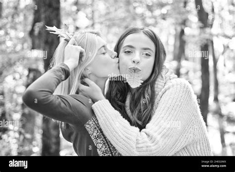 Best Friends Walk At Autumn Forest Beautiful Blonde Girl Kissing Her Bff Brunette Funny Crazy