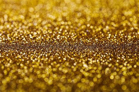 Fundo Dourado Do Glitter Foto De Stock Imagem De Borrado