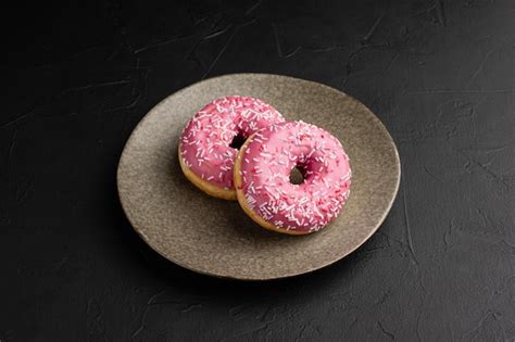 Premium Photo Donut Dessert Donuts On A Black Background