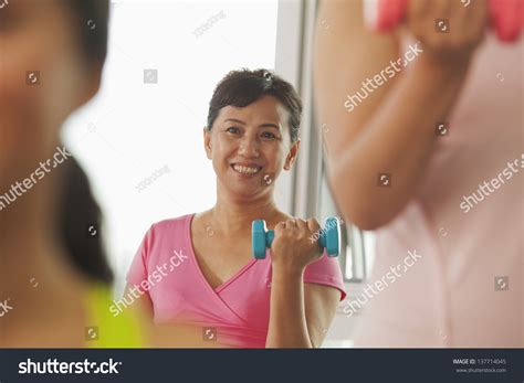 Mature Women Lifting Weights Gym Stock Photo Shutterstock