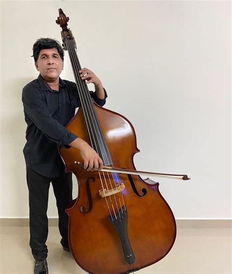 Double The Innovation How Musicians Niftily Weave In King Sized Double Bass Into Indian